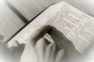 pointing out a versehow to start a bible reading plan - reading a bible pi
